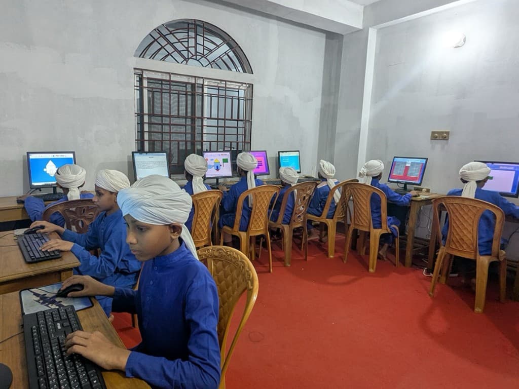 Students during a lesson at a partner madrasa